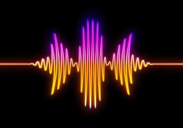 Colorful sound wave graphic on a black background