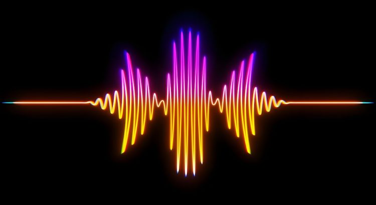 Colorful sound wave graphic on a black background